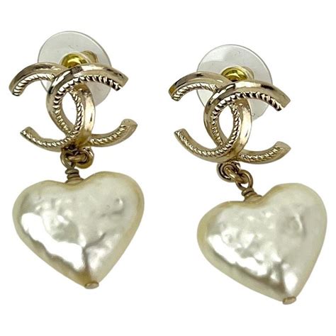 vintage chanel heart pearl earrings|pre owned Chanel earrings.